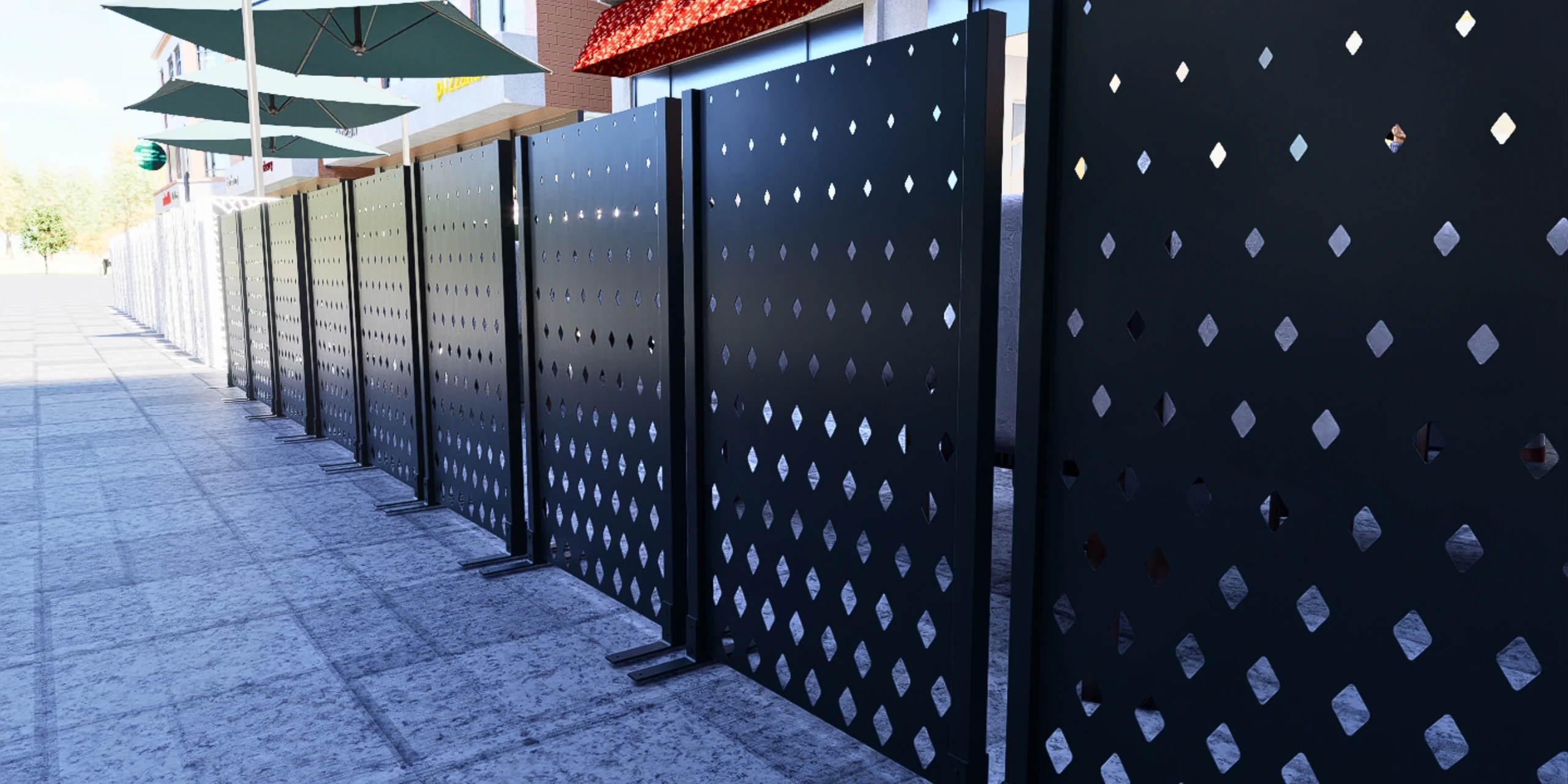 Wizualizacja pokazuje zestaw ciemnych paneli z ażurowymi otworami ustawionych na zewnętrznym tarasie w przestrzeni miejskiej.